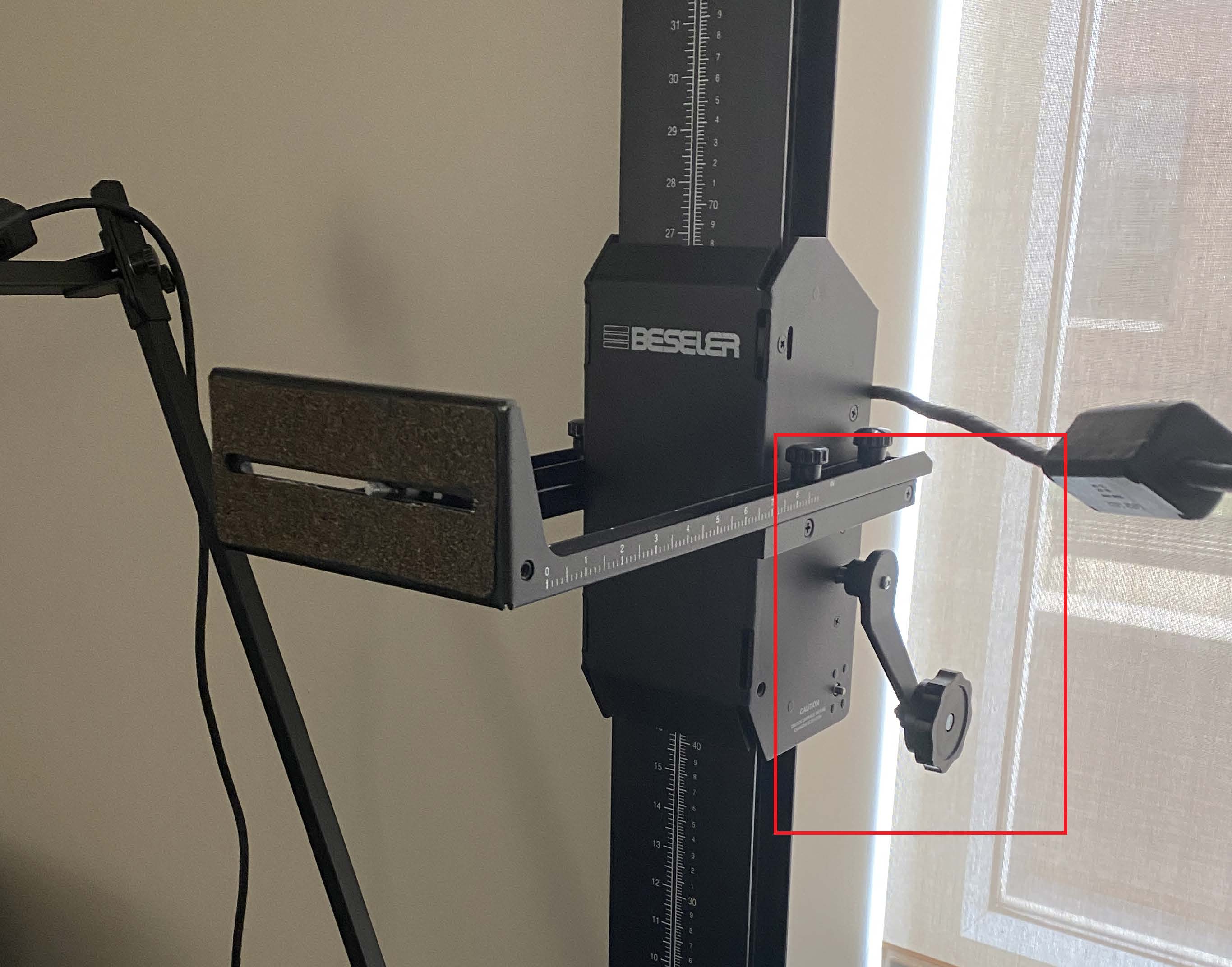 Camera mount raise and lower